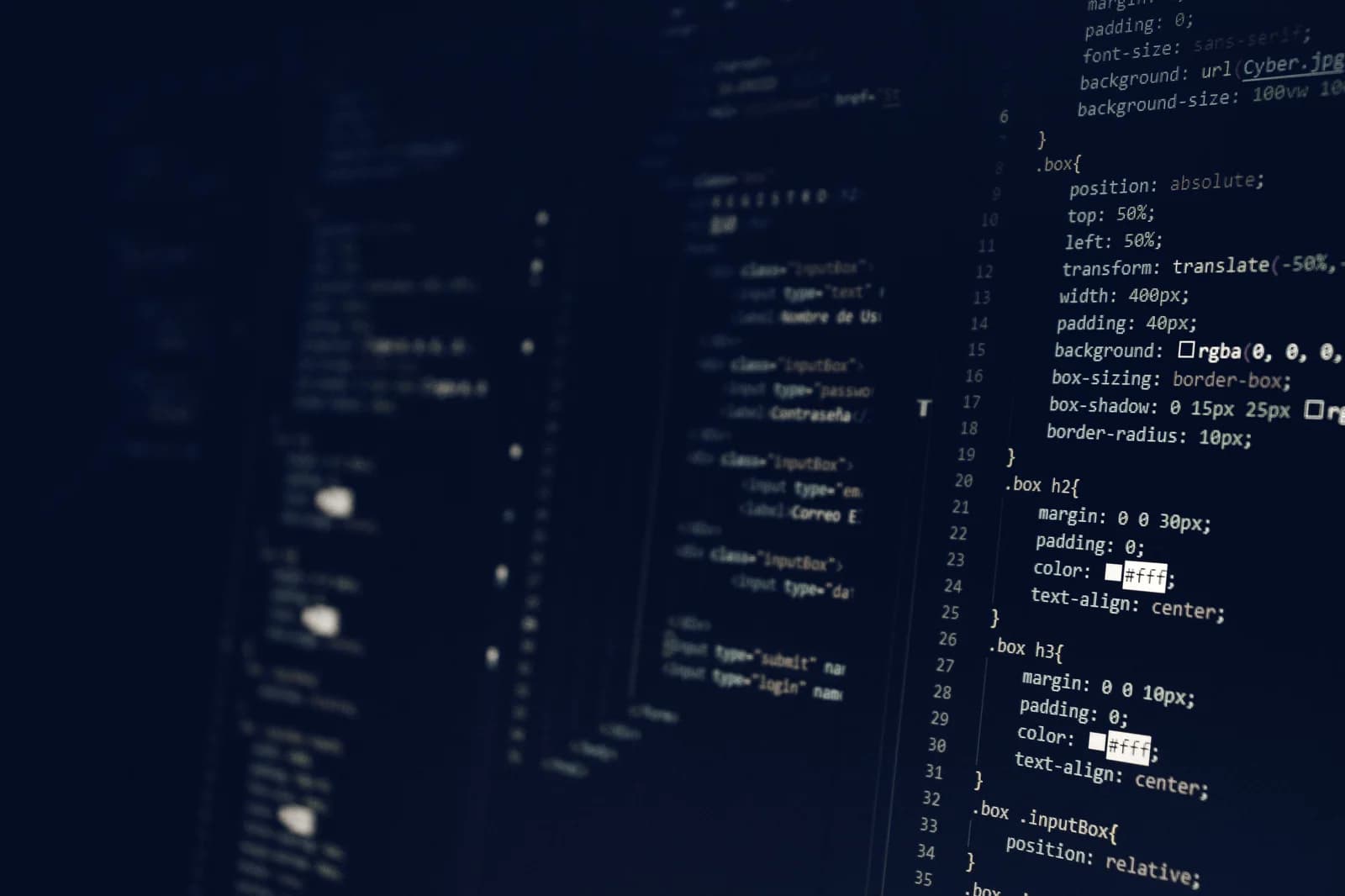 A pale concrete plane beside a dark facade.